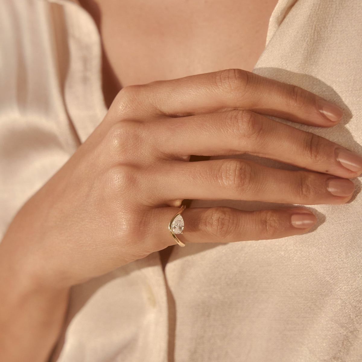 Curved Pear Moissanite Pinky Ring