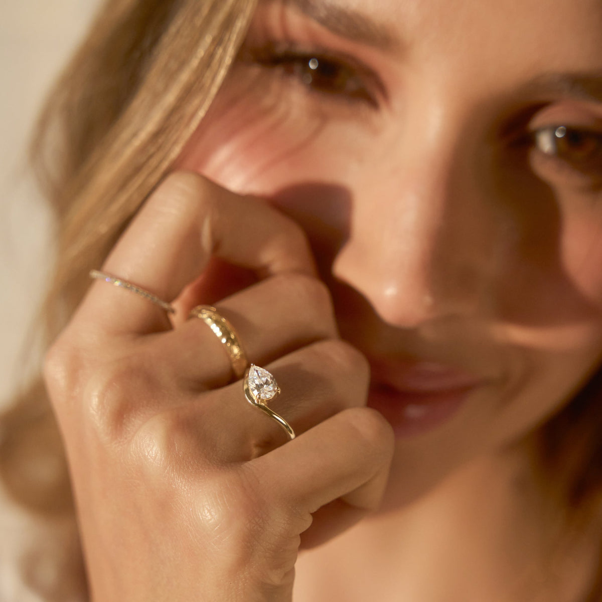 Curved Pear Moissanite Pinky Ring